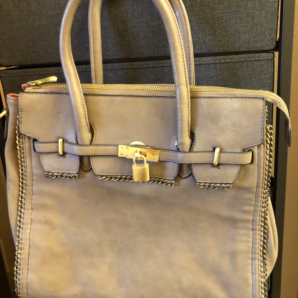 David Jones handbag tan with gold lock. Great day bag!